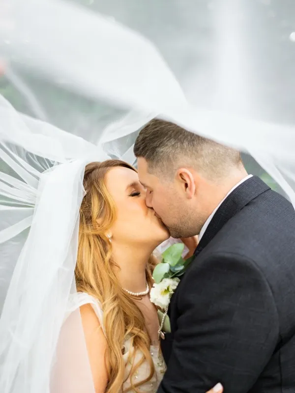 Candid bride and groom portrait captured in natural light